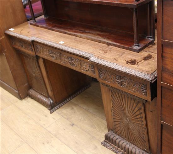 An Anglo-Indian carved teak desk W.150cm